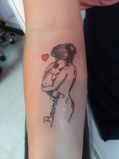 Explore grenade tattoo ideas, creative tattoo ideas in Marietta, available at Fantasy 2 Flesh Images