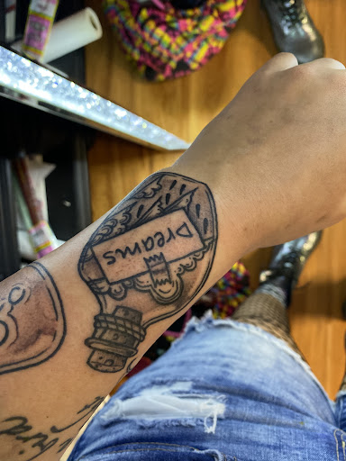 Explore paw tattoo ideas, creative tattoo ideas in Elkview, available at Andy Electric Tattoos