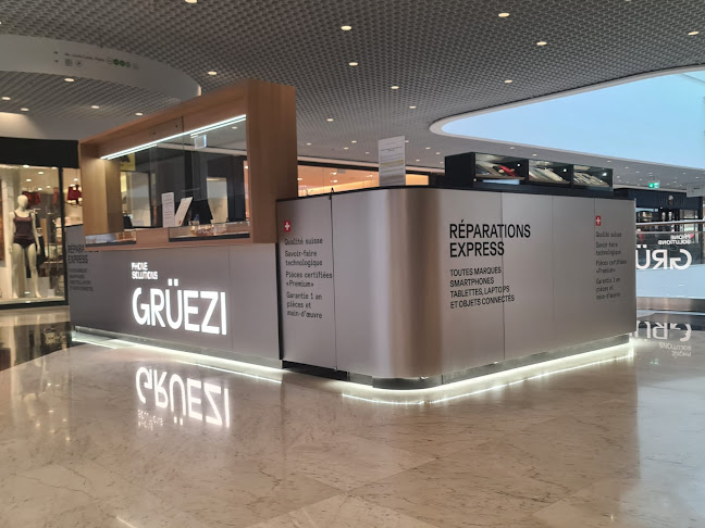 Grüezi - Phone Solutions - Balexert Genève - Réparation Express Smartphones Tablettes - Nyon