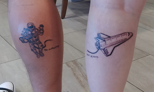 Explore ice hockey tattoo ideas, creative tattoo ideas in San Antonio, available at Rings of Fire Tattoos and Body Piercings