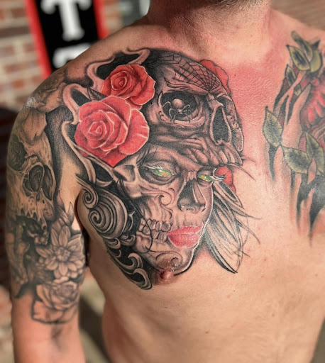 Explore half sleeve flower tattoo ideas, creative tattoo ideas in Warner Robins, available at Untold Pain Tattoo Studio