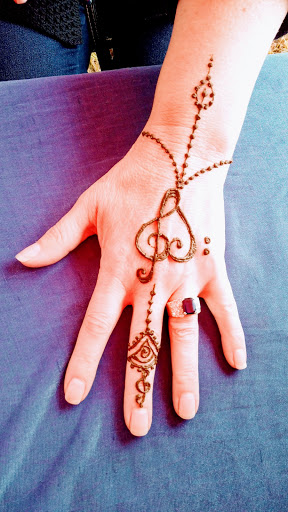 Explore fine line tattoo ideas for females, creative tattoo ideas in Concord, available at Naseera Fazil Henna Art