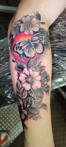 Explore mens space tattoo ideas, creative tattoo ideas in Angola, available at Hoodlum Ink