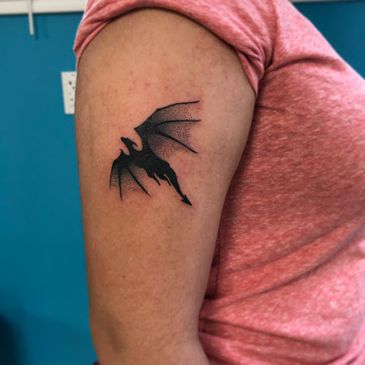 Explore number 9 tattoo ideas, creative tattoo ideas in Springdale, available at Tattoo Cartel