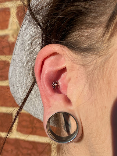 Find tattoo between breast ideas for your next unique tattoo in Greensboro at Fern Piercing and Fine Jewelry