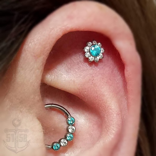 Explore tattoos behind ear ideas, creative tattoo ideas in Kearney, available at Studio 5150 Piercing & Fine Jewelry