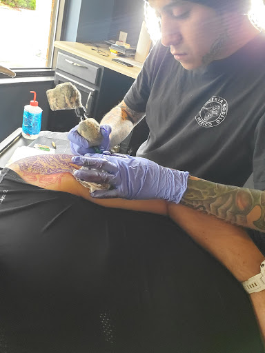 Explore latitude and longitude tattoo ideas, creative tattoo ideas in Greenwood, available at Vault 74 Tattoo, LLC