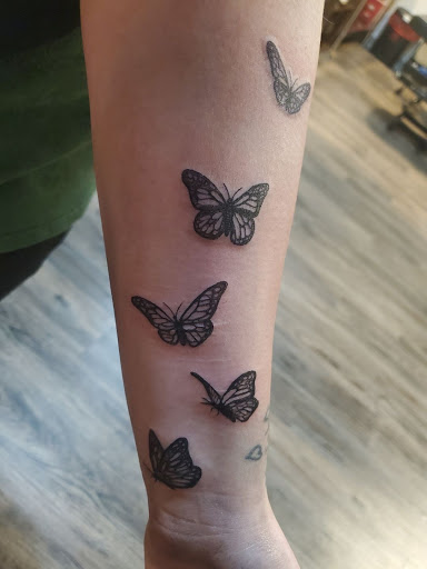 Explore sleeve forearm tattoo ideas for men, creative tattoo ideas in Rogers, available at Frisco Tattoo