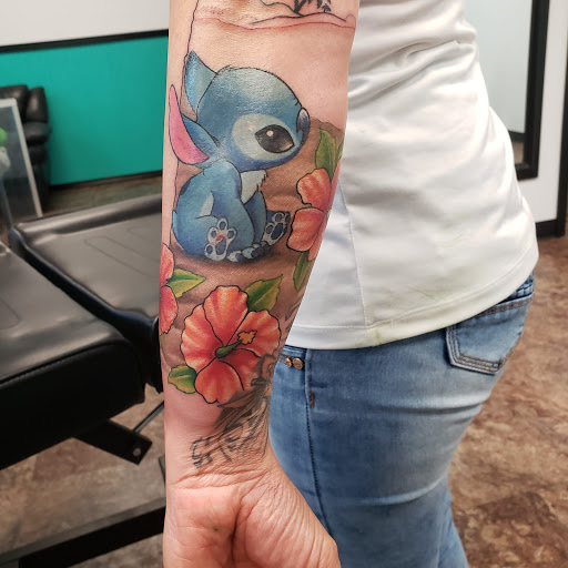 Explore knitting tattoo ideas, creative tattoo ideas in Lufkin, available at Blue Lotus Tattoo & Piercing