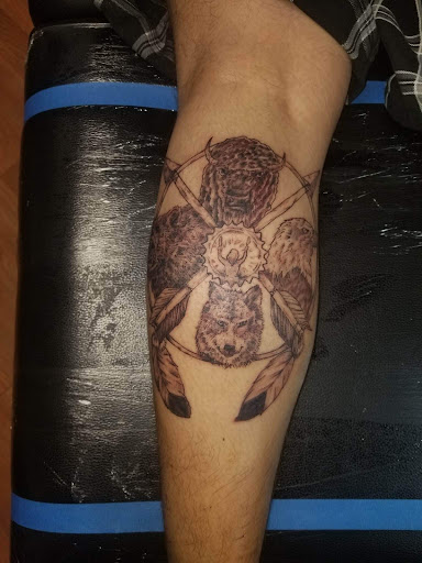 Explore atom tattoo ideas, creative tattoo ideas in Canon City, available at Royal Gorge Custom Tattoos & Piercings LLC