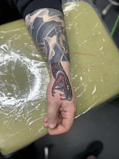 Explore fox and the hound tattoo ideas, creative tattoo ideas in Meridian, available at Creative Pain Tattoo Studio