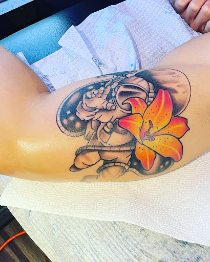 Explore mk tattoo ideas, creative tattoo ideas in Orange Park, available at Big City Tattoo and Piercing