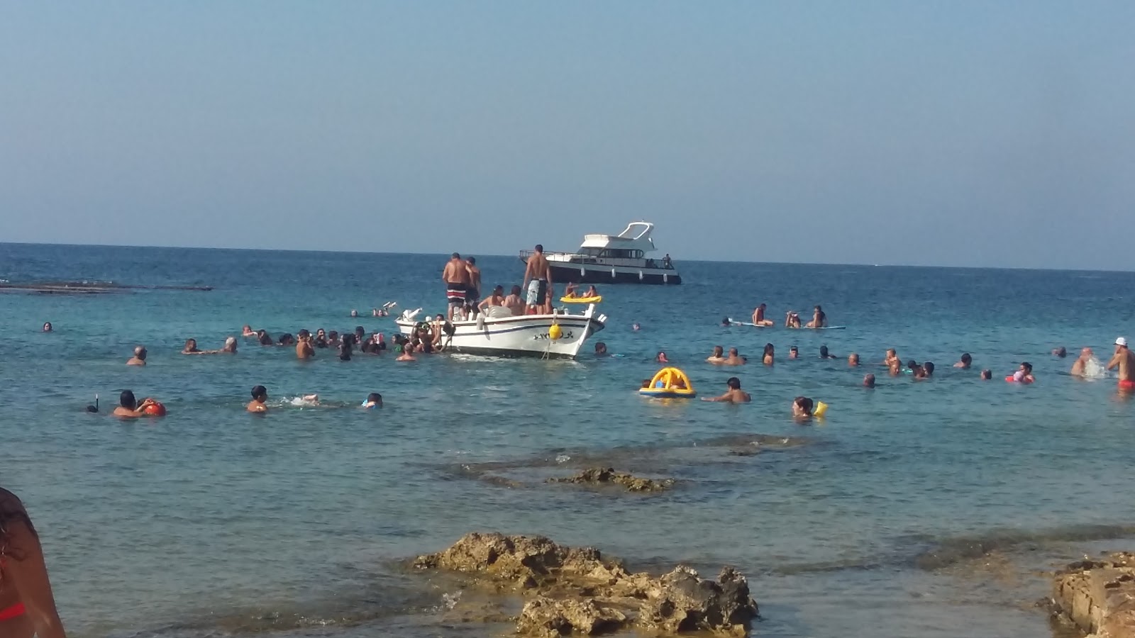 Photo of Hannouch beach with turquoise pure water surface