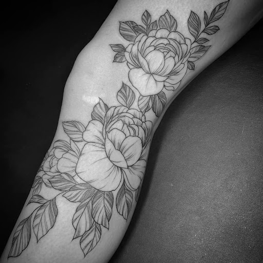 Find boyfriend name tattoo under breast ideas for your next unique tattoo in Hinesville at Dark Horse Art Studios