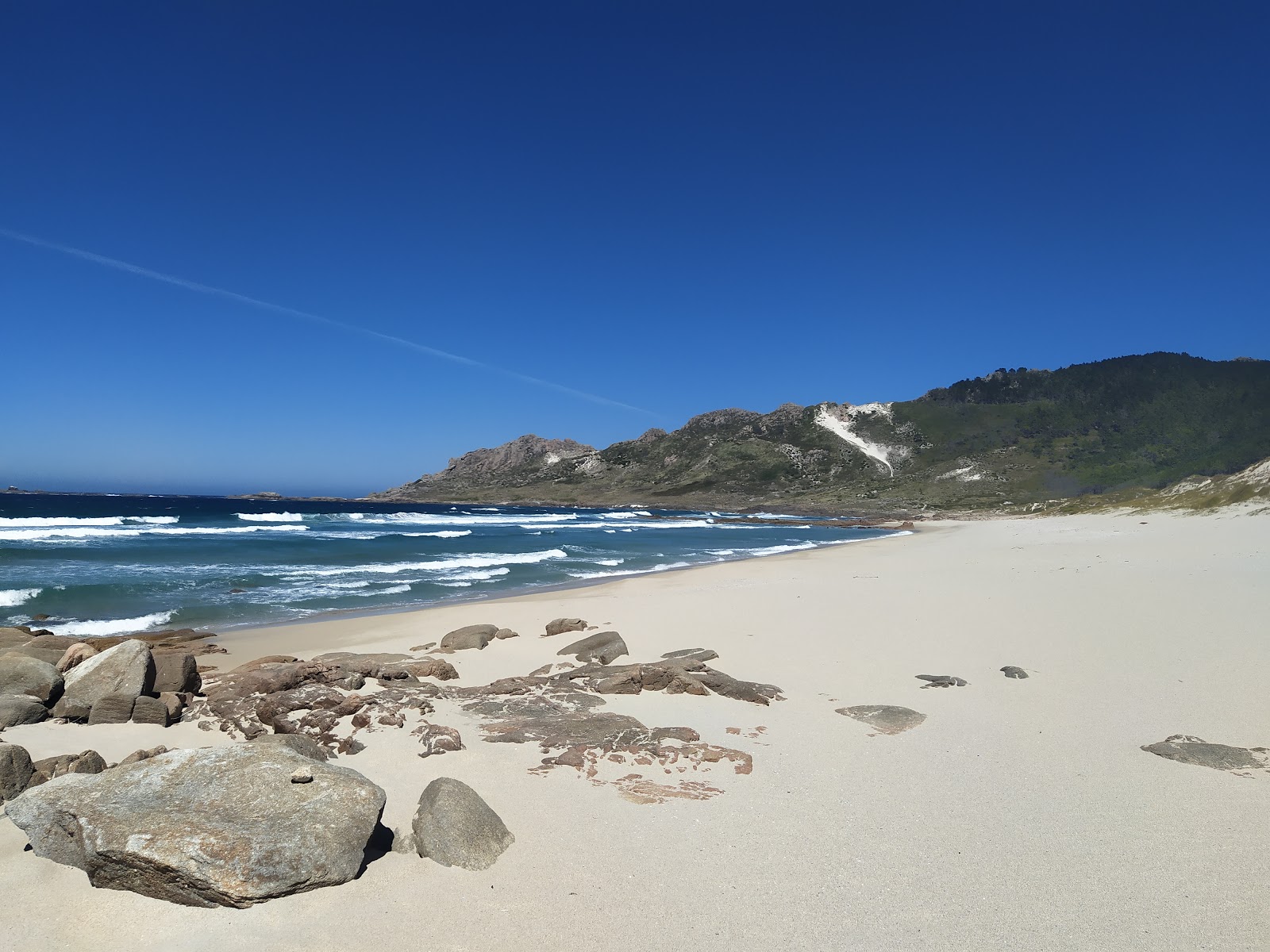 Foto van Playas de Trece met wit zand oppervlakte