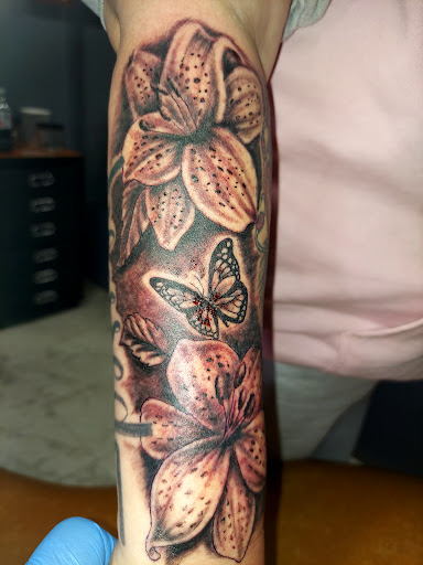 Explore thigh cover up tattoo ideas, creative tattoo ideas in Odessa, available at Little Dragon Tattoos Studio