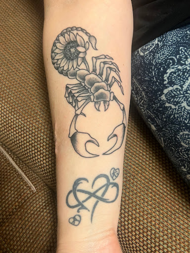 Explore rock climbing tattoo ideas, creative tattoo ideas in Omaha, available at Sailors Grave Tattoo