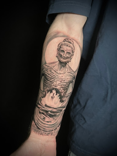 Explore mens calf tattoo ideas, creative tattoo ideas in Council Bluffs, available at Lil Bros Tattoo