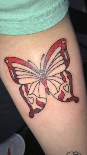 Explore neck tattoo ideas woman, creative tattoo ideas in Independence, available at Time Machine Tattoo