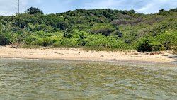 Photo de Praia dos Cosine entouré de montagnes