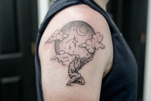Explore cake tattoo ideas, creative tattoo ideas in Logan, available at The White Wasp Tattoo Studio