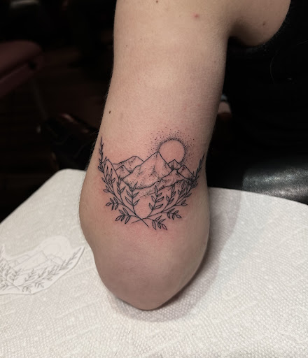 Explore hand finger tattoo ideas, creative tattoo ideas in Lander, available at Blackblood Tattoo and Piercing