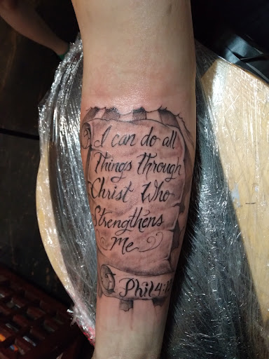 Explore boxing gloves tattoo ideas, creative tattoo ideas in Roanoke, available at RailYard INK