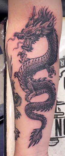 Explore dog paw tattoos ideas, creative tattoo ideas in Killeen, available at LaRudes Tattoos
