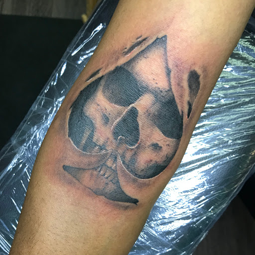 Explore male back tattoo ideas, creative tattoo ideas in Sanford, available at Hudson & Company Tattoo Studio