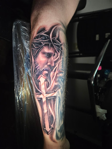 Explore hand poke tattoo ideas, creative tattoo ideas in Angola, available at Hoodlum Ink