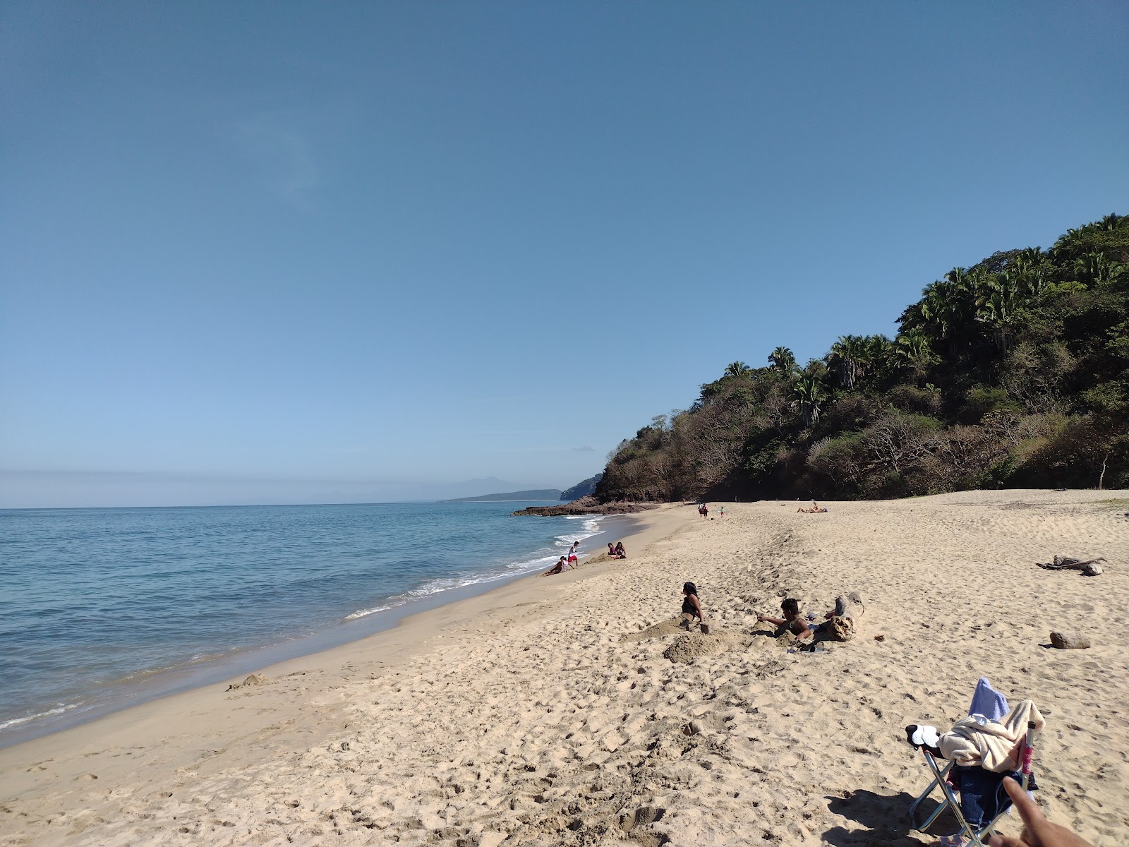 Los Venados beach的照片 带有碧绿色水表面