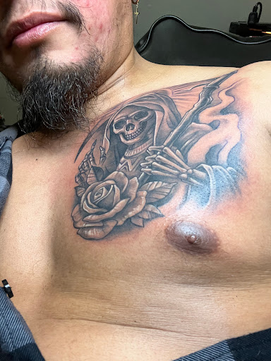 Explore cool chest tattoo ideas for guys, creative tattoo ideas in Milwaukee, available at Vantage Point Tattoo Milwaukee