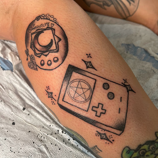 Explore cool first tattoo ideas for men, creative tattoo ideas in Buffalo, available at True Gloom Tattoo Studio