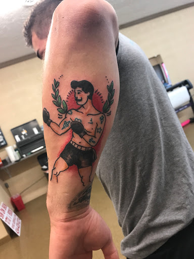 Explore strength tattoo ideas, creative tattoo ideas in Madison Heights, available at Sin on skin tattoo and piercing