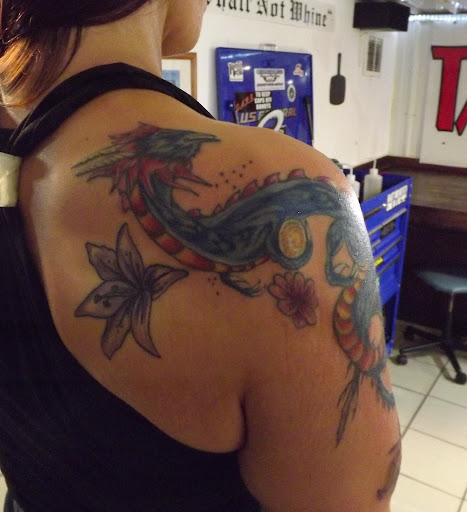 Find chest tattoo ideas for women for your next unique tattoo in Princeton at Custom Dreams Tattooing and Body Piercing