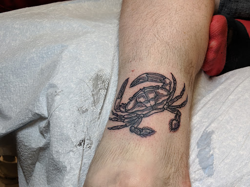 Explore breast cancer ribbon tattoo ideas, creative tattoo ideas in Baltimore, available at Have Fun Be Lucky Tattoo