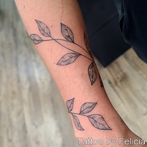 Explore dark art tattoo ideas, creative tattoo ideas in Fort Myers, available at Tiger Lotus Tattoo and Piercing