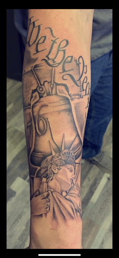 Explore leg sleeve tattoo ideas for men, creative tattoo ideas in Cambridge, available at Branded Tattoo Co