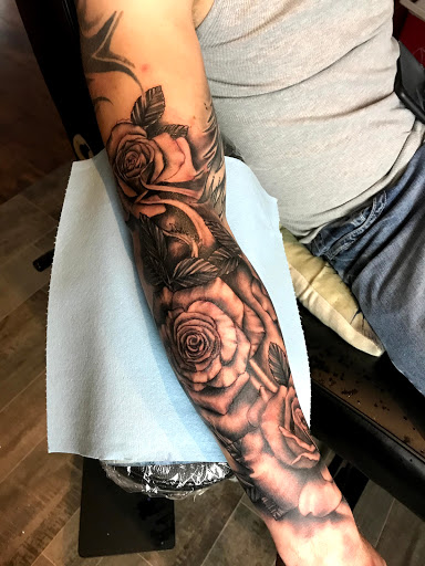 Explore awesome half sleeve tattoo ideas, creative tattoo ideas in Kingsford, available at Deft Tattoo Studio
