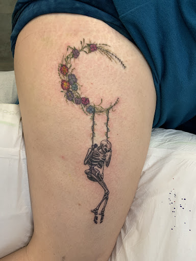 Explore tattoo ideas for thigh, creative tattoo ideas in Arlington, available at Rock and Rose Tattoo