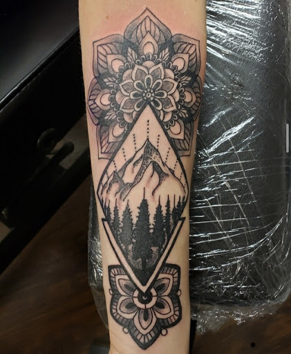Explore darts tattoo ideas, creative tattoo ideas in Alamosa, available at The Shop Tattoo & Comics