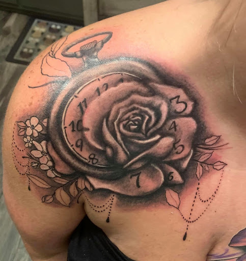 Explore leo tattoo ideas for men, creative tattoo ideas in Mayodan, available at Bleeding Ink Tattoo