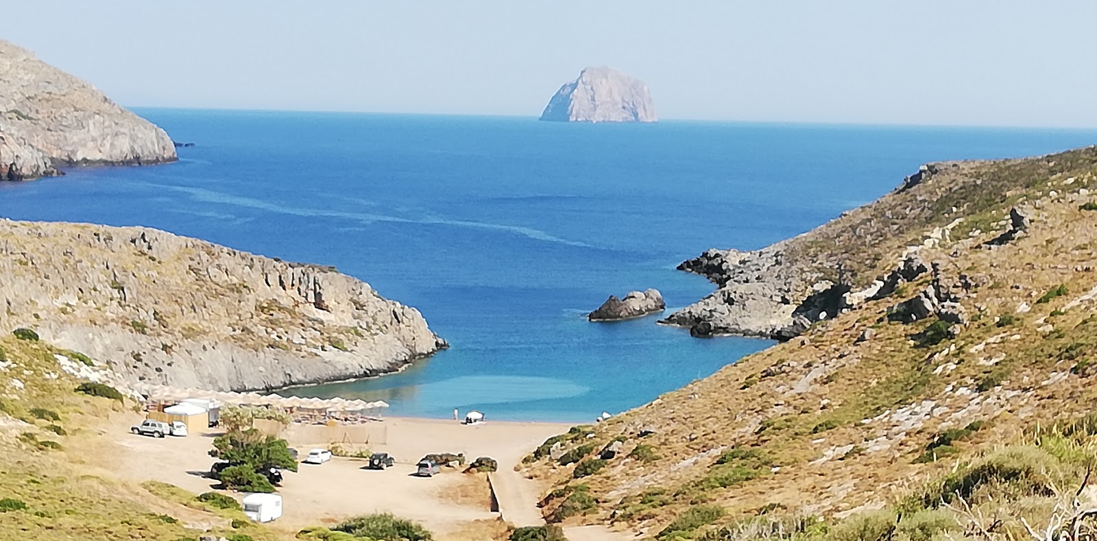 Foto van Paralia Melidoni met grijs zand en kiezels oppervlakte