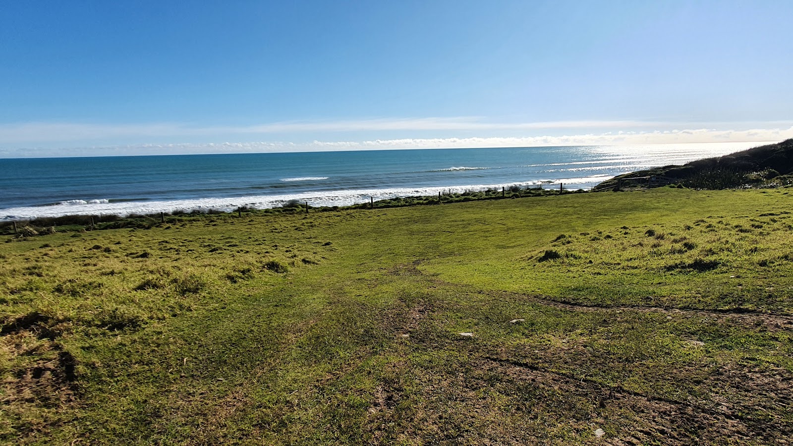 Otuhie Beach的照片 带有碧绿色水表面