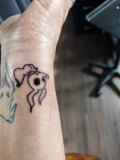 Explore birthday tattoo ideas for men, creative tattoo ideas in Kewanee, available at Splat Ink tattoos and piercings