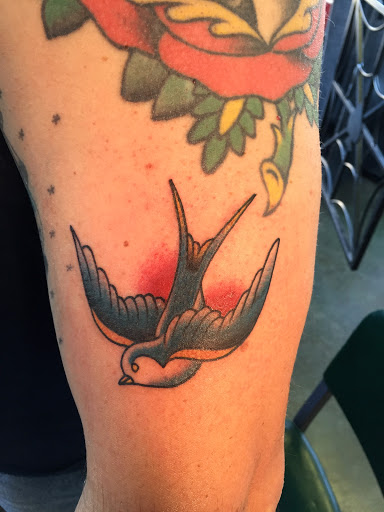 Explore warrior tattoo sleeve ideas, creative tattoo ideas in Reno, available at Aces Tattoo