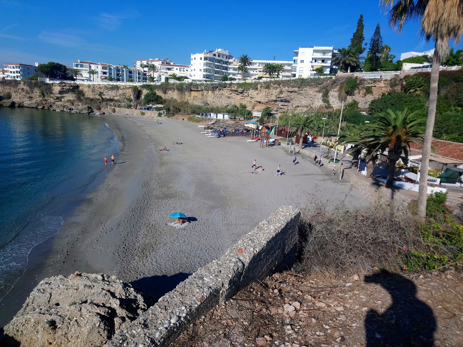 Fotografie cu Playa la Caletilla cu o suprafață de nisip gri