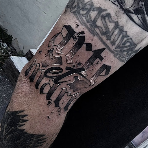 Find cute cat tattoo ideas for your next unique tattoo in Valdosta at Acid Ink Tattoos