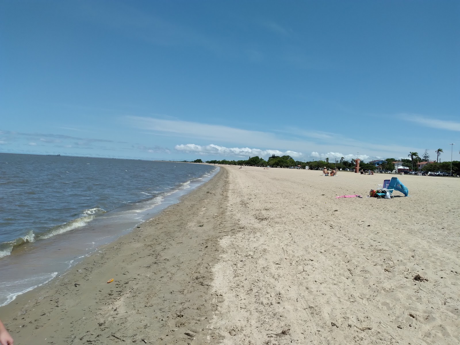 Foto von Laranjal Beach mit beiger sand Oberfläche