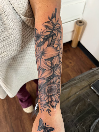 Explore spartan helmet tattoo ideas, creative tattoo ideas in Rogers, available at Ink Solutions Tattoo